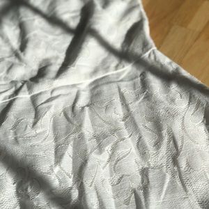 White lace dress with gold zipper